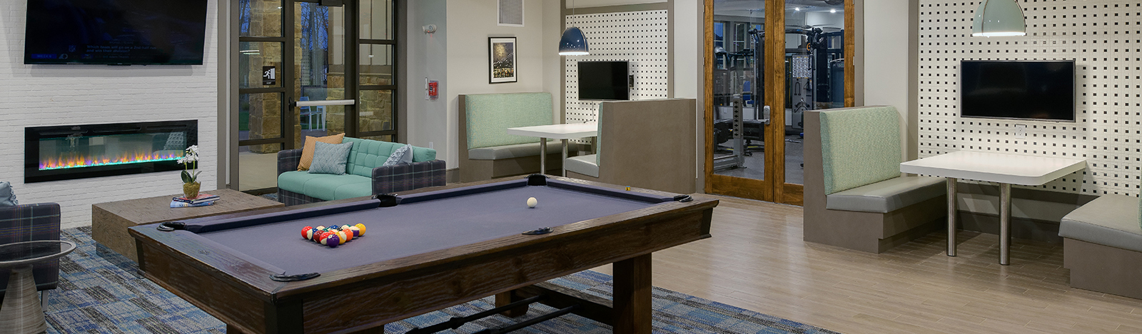 Resident clubhouse featuring a pool table