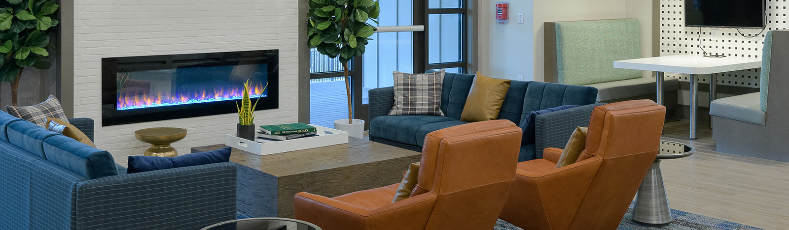 Resident lounge featuring a fire place